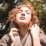 sensual-woman-scarf-enjoying-weather_23-2147911426